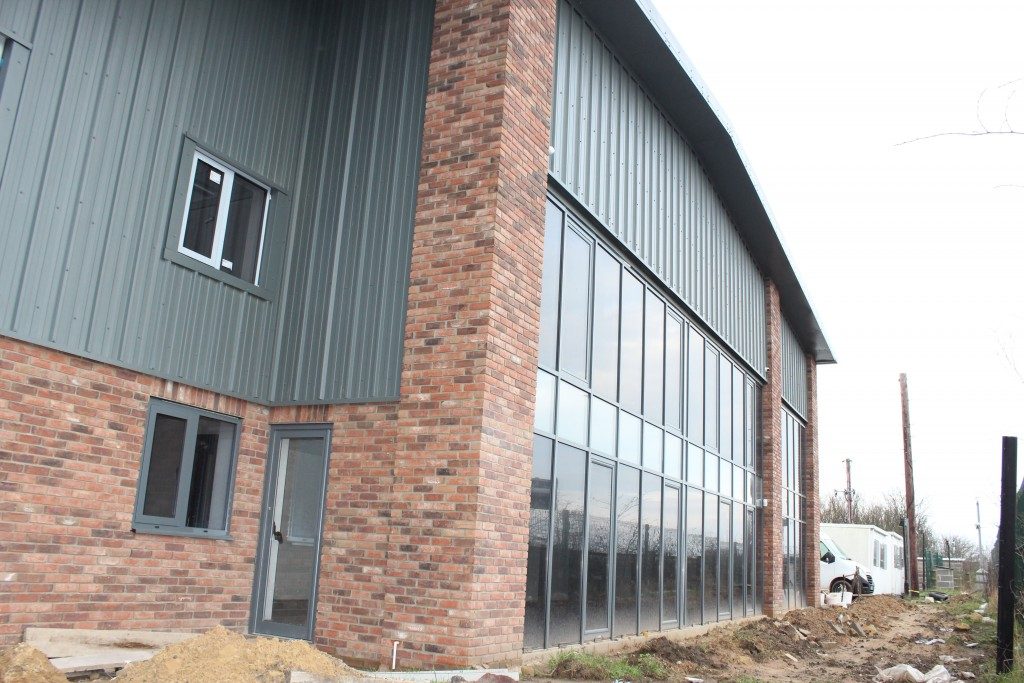 Office building with brick, timber and glazed frontage built by JSL Construction