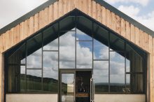 Steel framed barn conversion with a fully glazed gable end